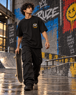 Quiet Frequency unisex black oversized streetwear T-shirt – male front standing