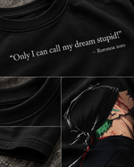 RUZE Against Doubt black oversized T-shirt — male seated lifestyle front graphic visible