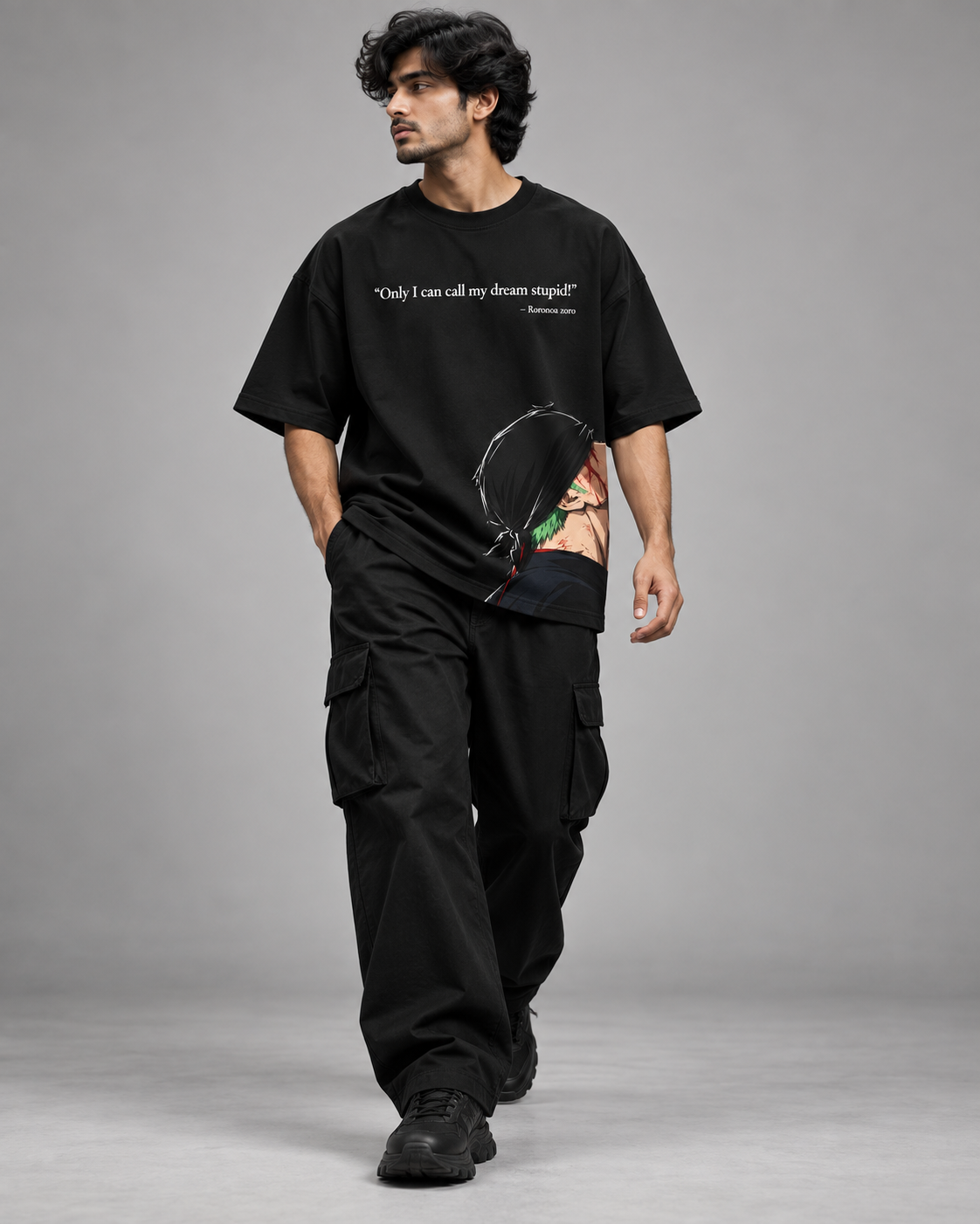 RUZE Against Doubt black oversized T-shirt — male seated concrete block studio lifestyle