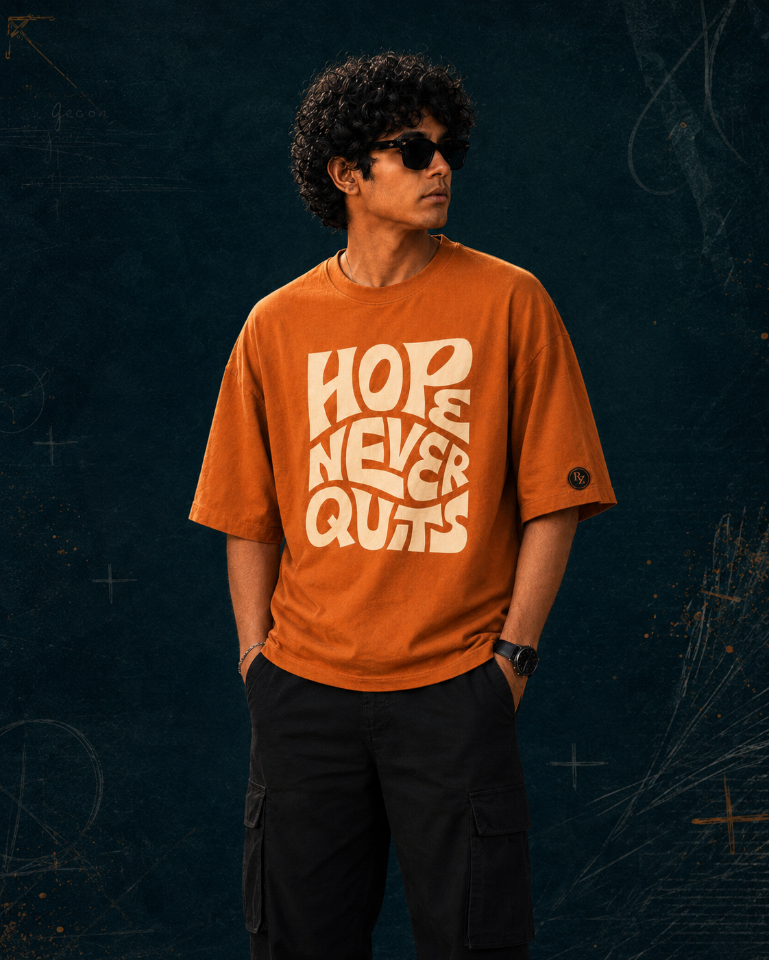 RUZE Hope Never Quits burnt orange oversized T-shirt Keep Going campaign front