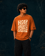 RUZE Hope Never Quits burnt orange oversized T-shirt Keep Going campaign front