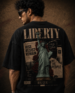 Stand Unmoved washed black oversized T-shirt – female back artwork full-body