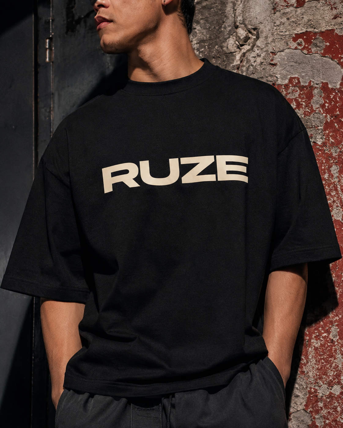 Close-up of a black RUZE promotional heavyweight t-shirt